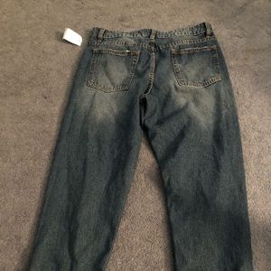 Distressed blue jeans